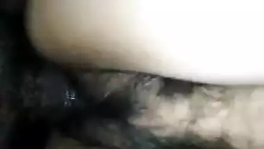 Desi girl has XXX tool of man behind the camera in her hairy pussy