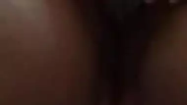 Desi porn girl with glasses dances and pisses in an empty bottle