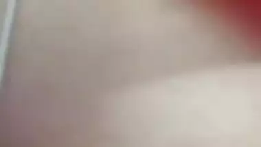 Indian holds a sex camera and touches her own XXX jugs and shaved slit