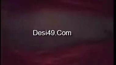 Young gal in red lingerie teases her XXX Desi pussy for the camera