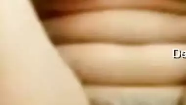 Desi whore strips and actively XXX drills her twat with long dildo