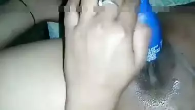 Hot Desi female shows off her smooth XXX pussy shoving a sex toy inside