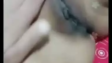 Desi gal grabs camera in time to record how she rubs own XXX pussy