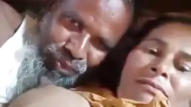 An old man enjoys the boob sucking of a desi lady