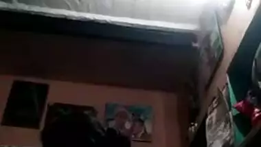 Amateur Desi slut puts off red bra and shows big XXX tits for cam