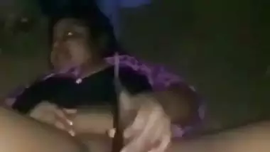 Nude desi lady fucks her hairy pussy with a brinjal