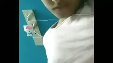 Indian girl listens to the music and exposes XXX tits on camera
