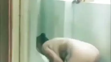 A chubby Desi aunty bathing outdoor nude on cam for her lover XXX video