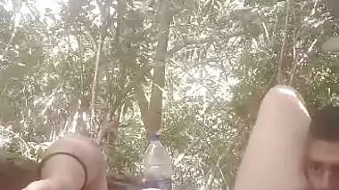 Mistress lets her servant lick her pussy during outdoor sex