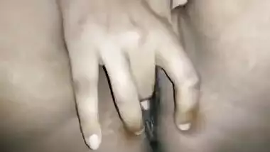 Solo porn clip in which amateur Indian gal gently touches wet twat
