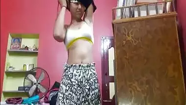 Tempting Desi teen sets camera to film her sex belly during XXX changing